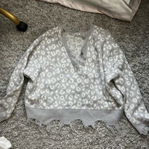 Rue 21 size small cheetah sweater.